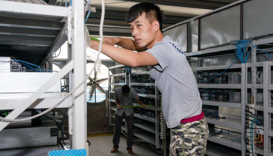 A high-performance ASIC miner in action, showcasing the hardware's robust design for optimal Bitcoin hashing