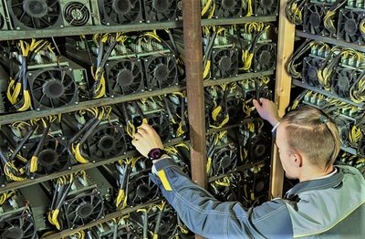 Large-scale cryptocurrency mining farm hosting diverse mining rigs
